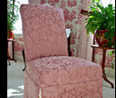 pink slipcovered chair